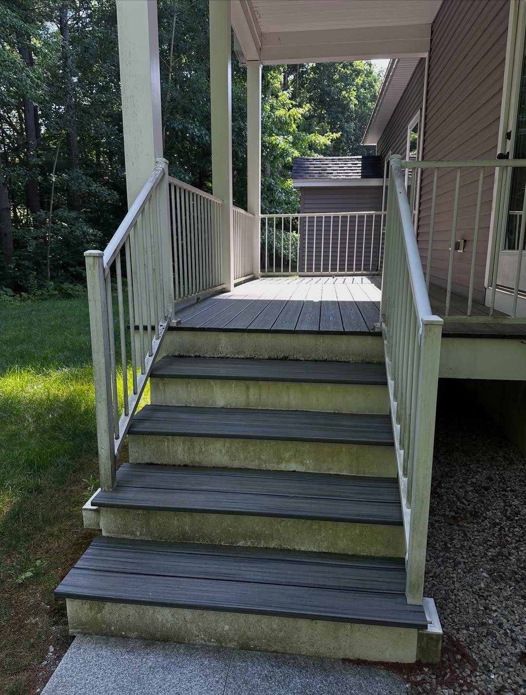Before: Deck stairs with green growth on every tread