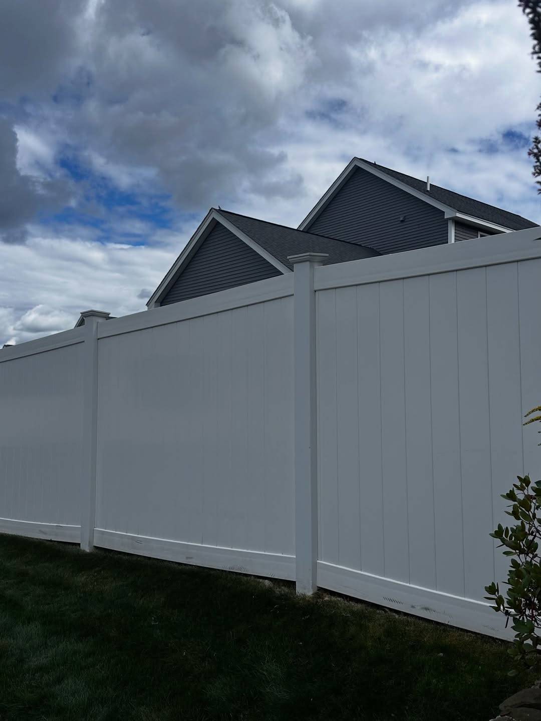 After: The same fence, white again