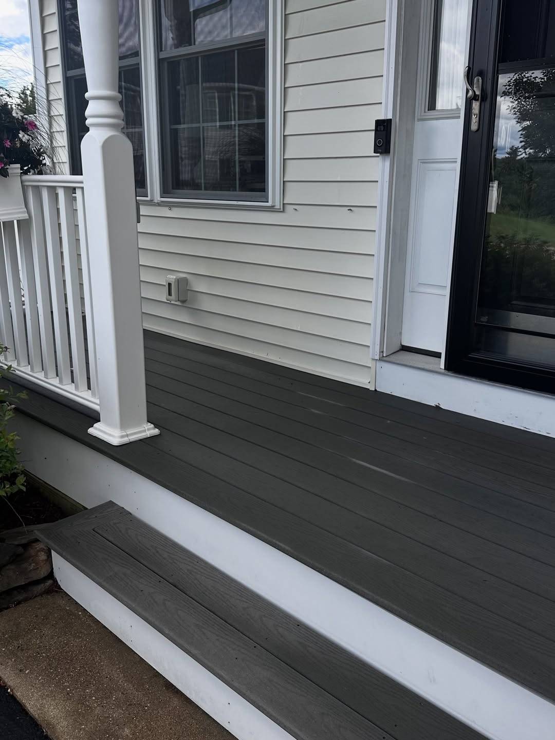 After: The same porch edge washed